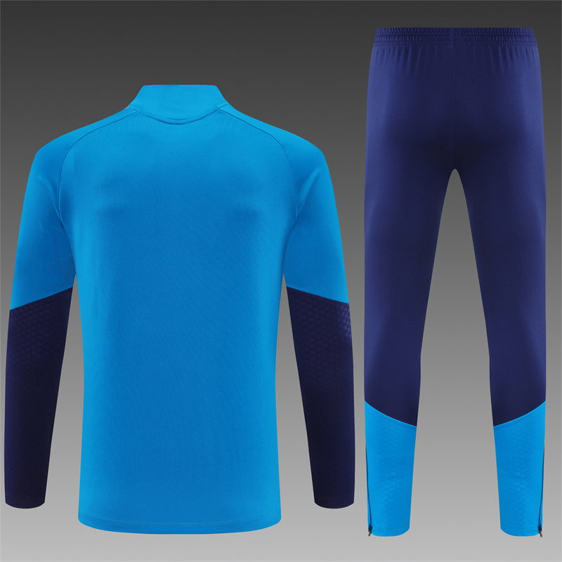 Spanje Half-Pull Trainingspak 'Blauw' 26/27 - KINDEREN