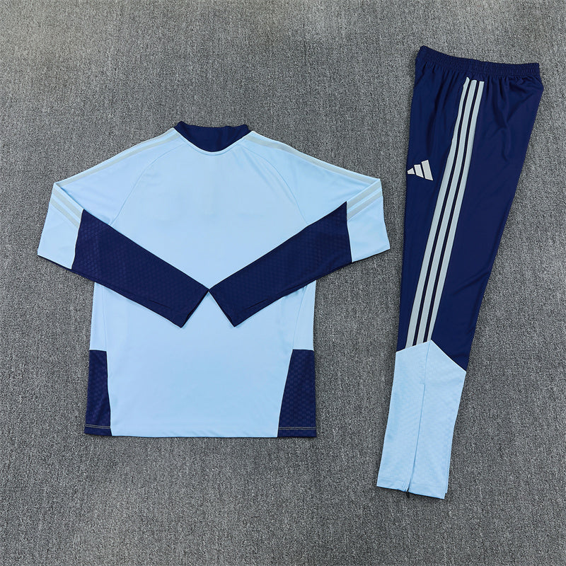 Ajax Half-Pull Trainingspak 'Lichtblauw' 26/27 - KINDEREN