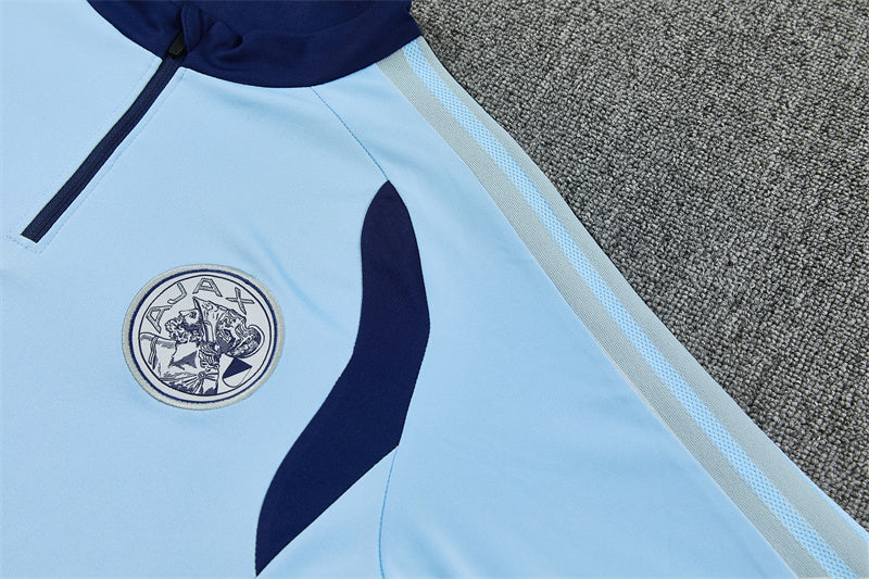 Ajax Half-Pull Trainingspak 'Lichtblauw' 26/27 - KINDEREN