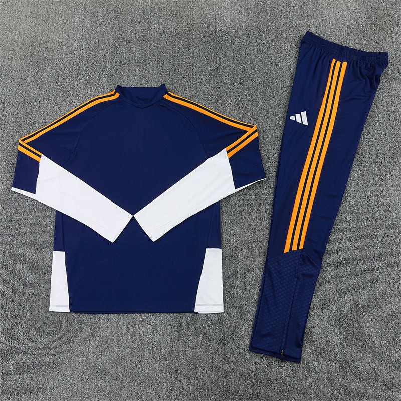 Real Madrid Half-Pull Trainingspak 'Blauw-Oranje' 26/27 - VOLWASSENEN