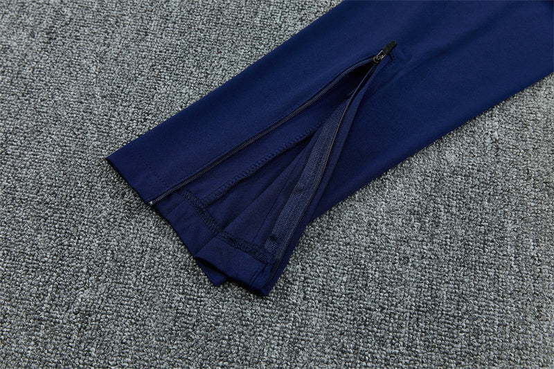 Barcelona Half-Pull Trainingspak 'Blauw-Groen' 26/27 - VOLWASSENEN