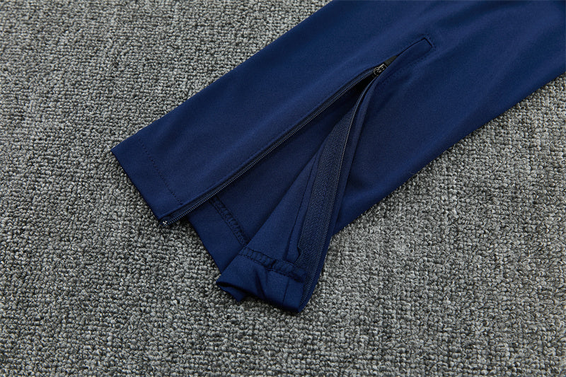 Barcelona Half-Pull Trainingspak 'Rood-Blauw' 26/27 - KINDEREN