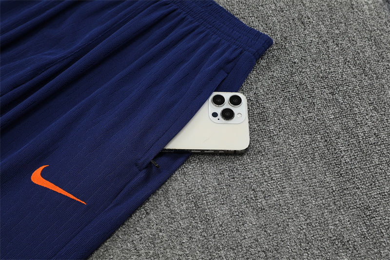 Barcelona Half-Pull Trainingspak 'Blauw-Oranje' 25/26 - VOLWASSENEN