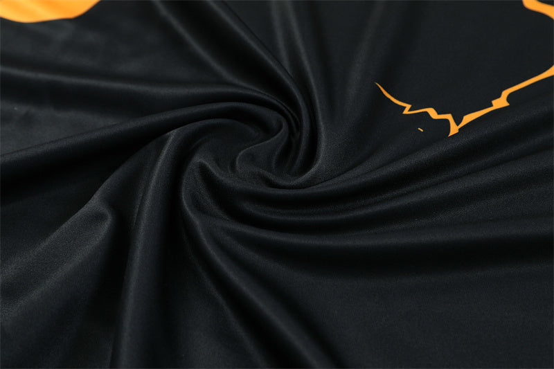 Real Madrid Half-Pull Trainingspak 'Zwart-Oranje' 25/26 - KINDEREN