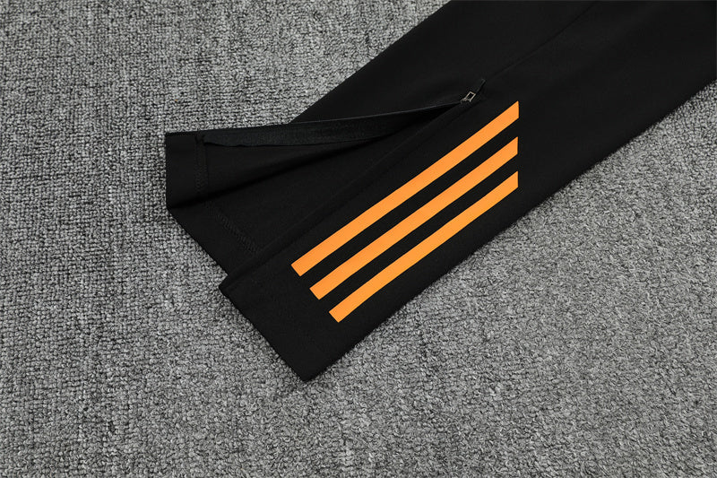 Real Madrid Half-Pull Trainingspak 'Zwart-Oranje' 25/26 - KINDEREN