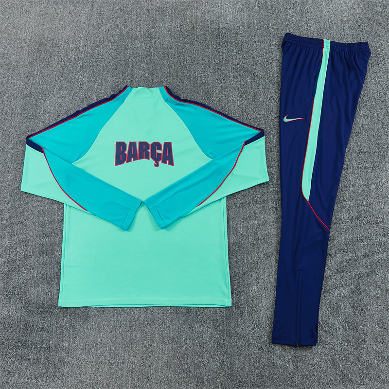 Barcelona Half-Pull Trainingspak 'Blauw-Groen' 26/27 - VOLWASSENEN